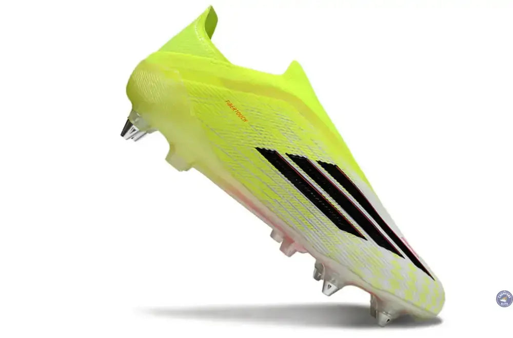 Image of Chaussure de football F50 LACELESS ELITE SG jaune et noir avec rouge lucide et crampons.