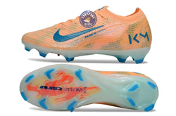 Image of MERCURIAL VAPOR 16 ELITE FG Kylian Mbappe - Orange/Bleu turquoise FG
